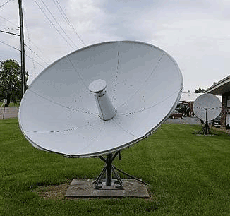 A picture of the large satellite dishes that were prevalent in the 1980s.